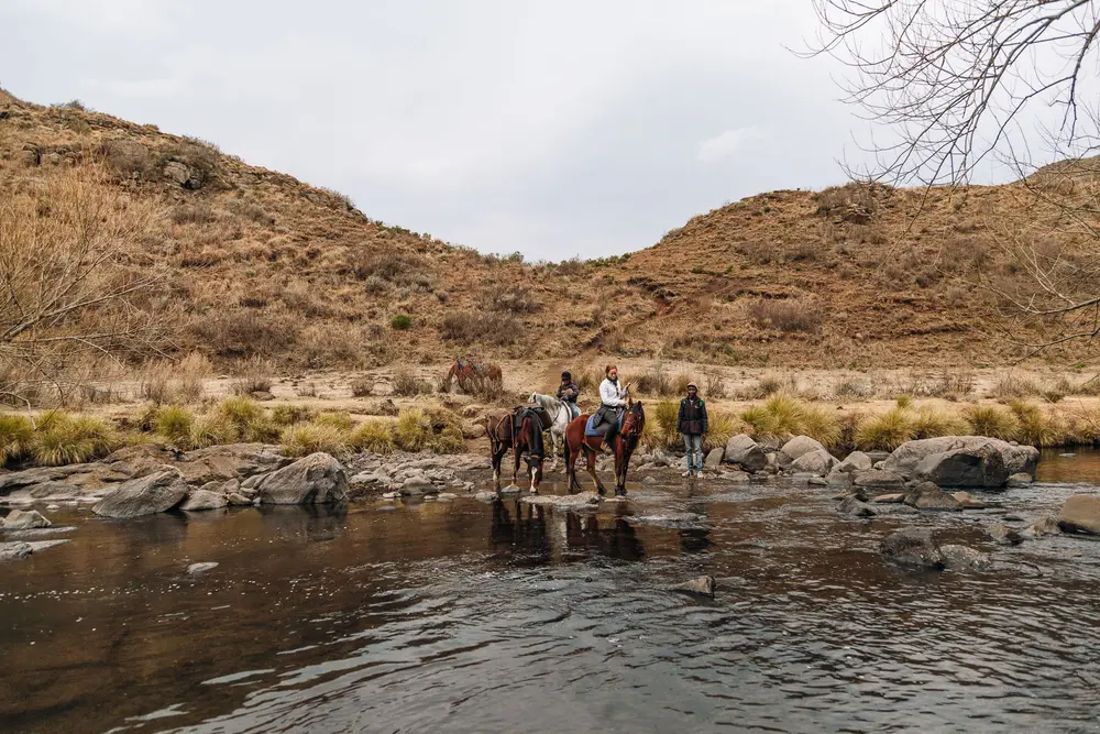 Keeping dry crossing the Ketane River