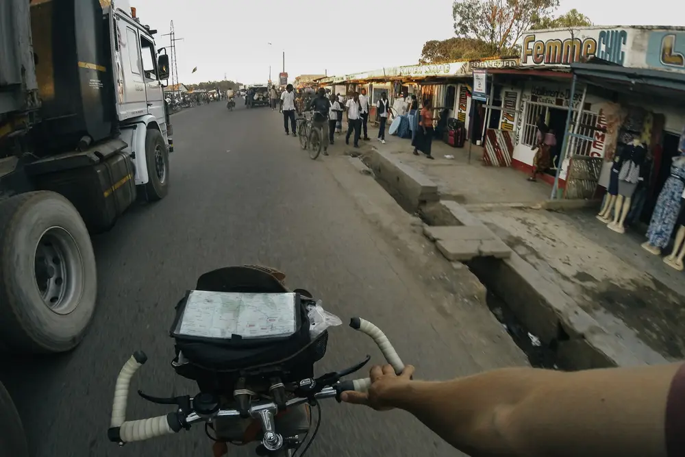 Dodging inbetween trucks and taxis as we arrive into Lubumbashi, the mining capital of the DRC and our first stop.