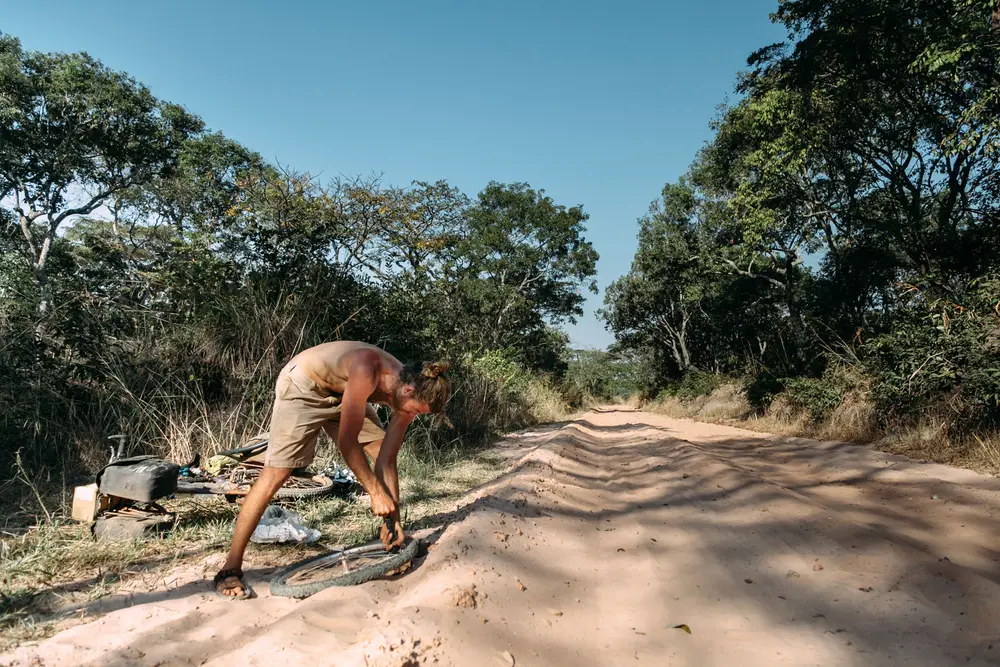 Sandy roads aren't fun; sandy roads and getting a puncture is even less fun.
