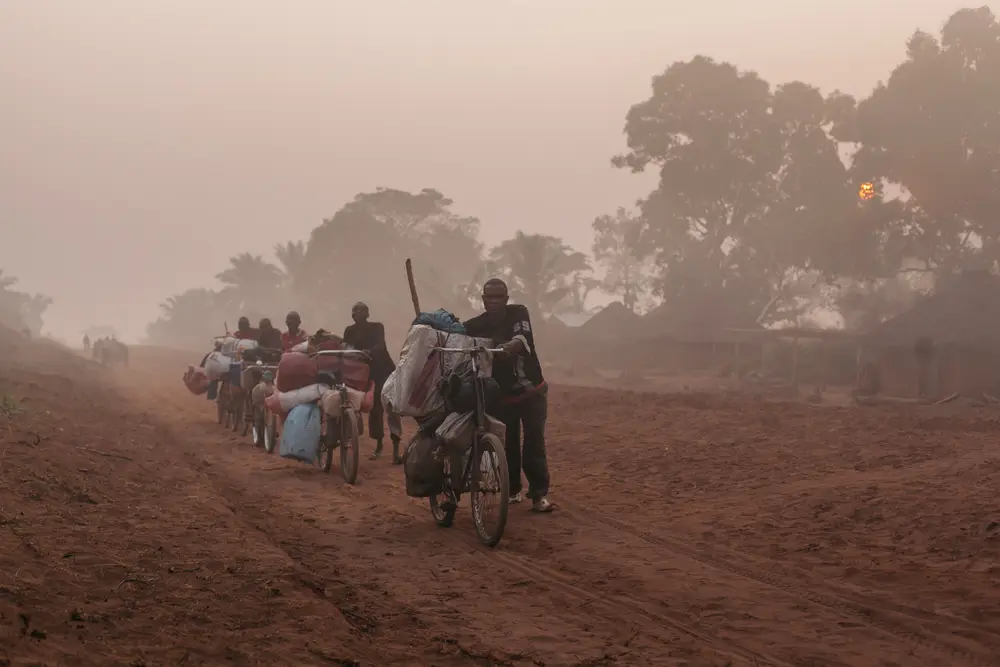 With the roads in such a terrible state of decay, the main mode of goods transport is with these tough porters who push their loads along the sandy trail hoping for a bit of downhill during which to jump on their bicycles. They often travel several …