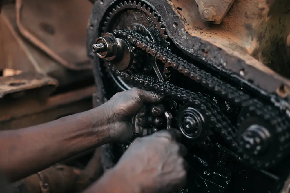 By mid-morning, the truck's engine remains in many pieces. With minimal traffic passing, we are lucky to flag down a land cruiser. At first they hesitate to offer us a lift with all our baggage and bicycles but, seeing Charlie's deteriorating state …