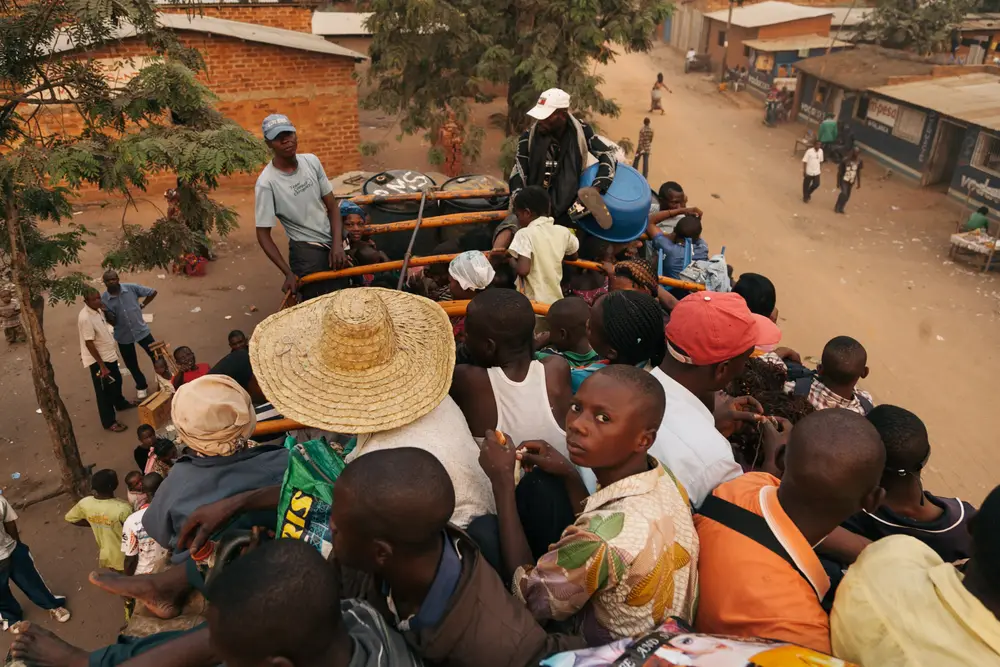 Riding on the trucks is the only motorised way out of Kananga. For some, cycling is the only option and can take them days or weeks to reach their intended destination.