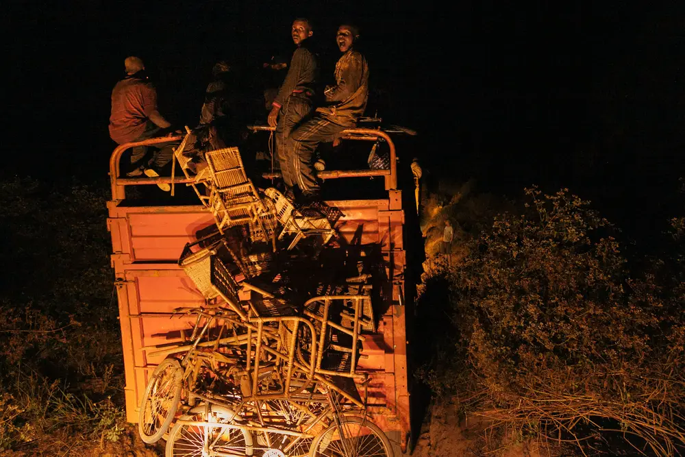 A convoy of trucks forms as we drive through the night.