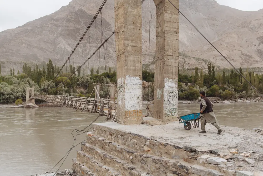 Along the valley, wooden suspension bridges give access to life across the river. Some bridges are in better shape than others.